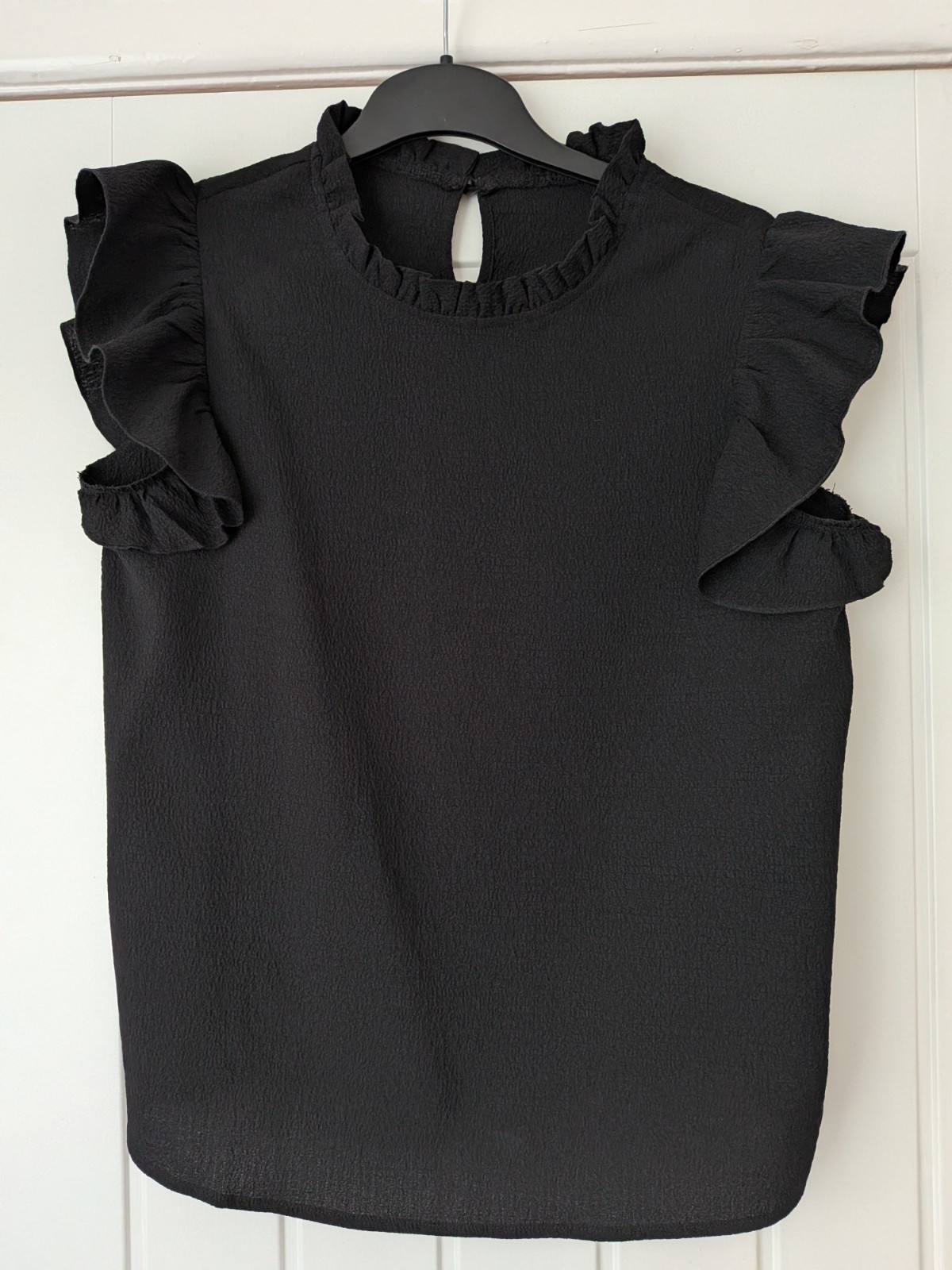 Black Frilly Sleeveless Blouse with ruffled neckline size M /US6/EU38
