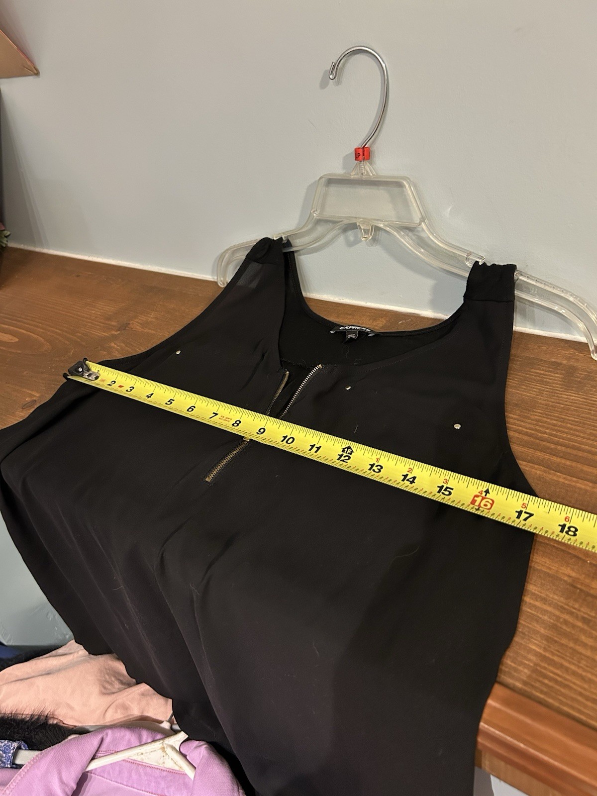 Express black sleeveless top gold half-zipper accent decorative front pockets