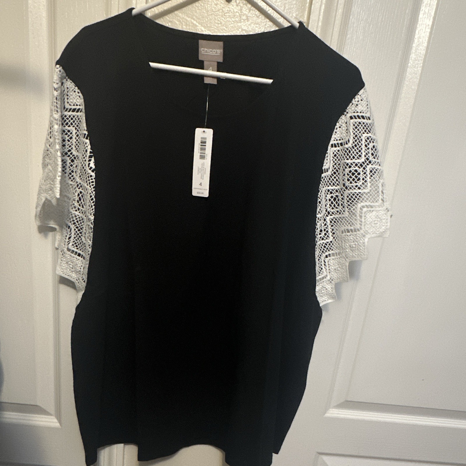 Chico’s Womens Size 4 Round Neck Short Sleeve Solid Black Top White Lace