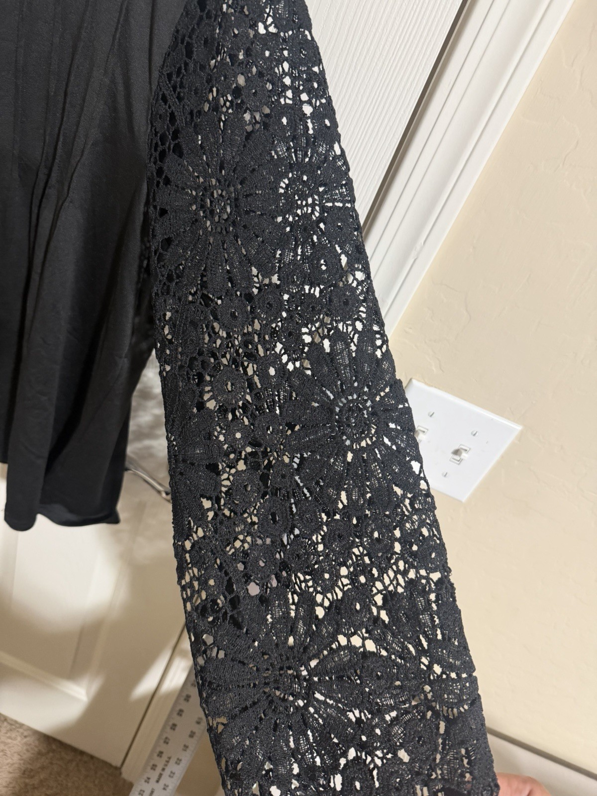 Blackpolyester & spandex blouse with lace sleeves and button-up front size 2XL