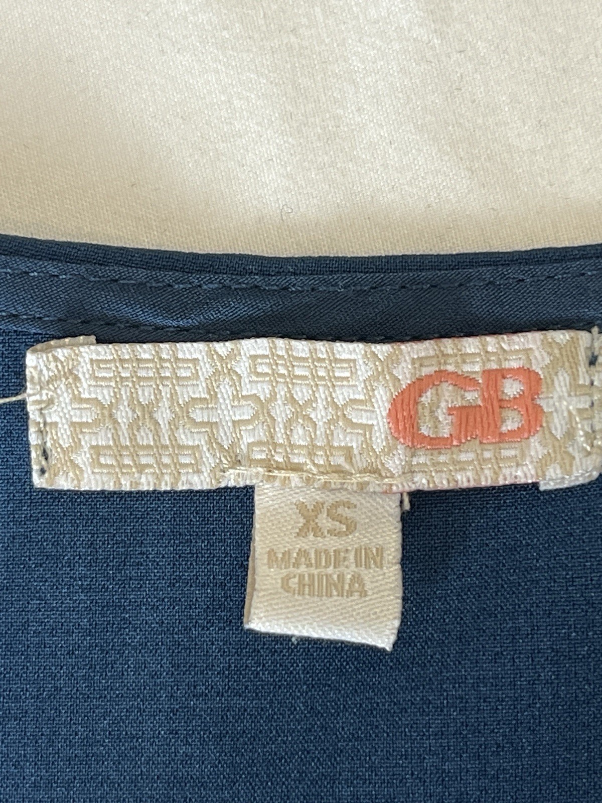 Gianni Bini Navy sleeveless tank red white XS orange piping along the side seams