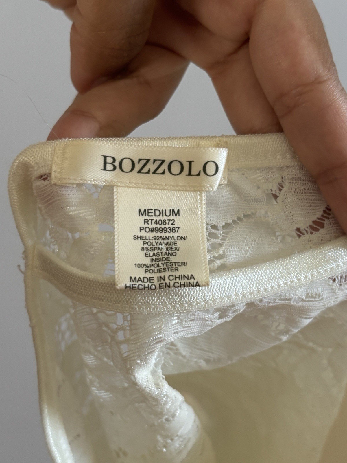Bozzolo White Lace Top Size M (one side of the built in bra is uneven)