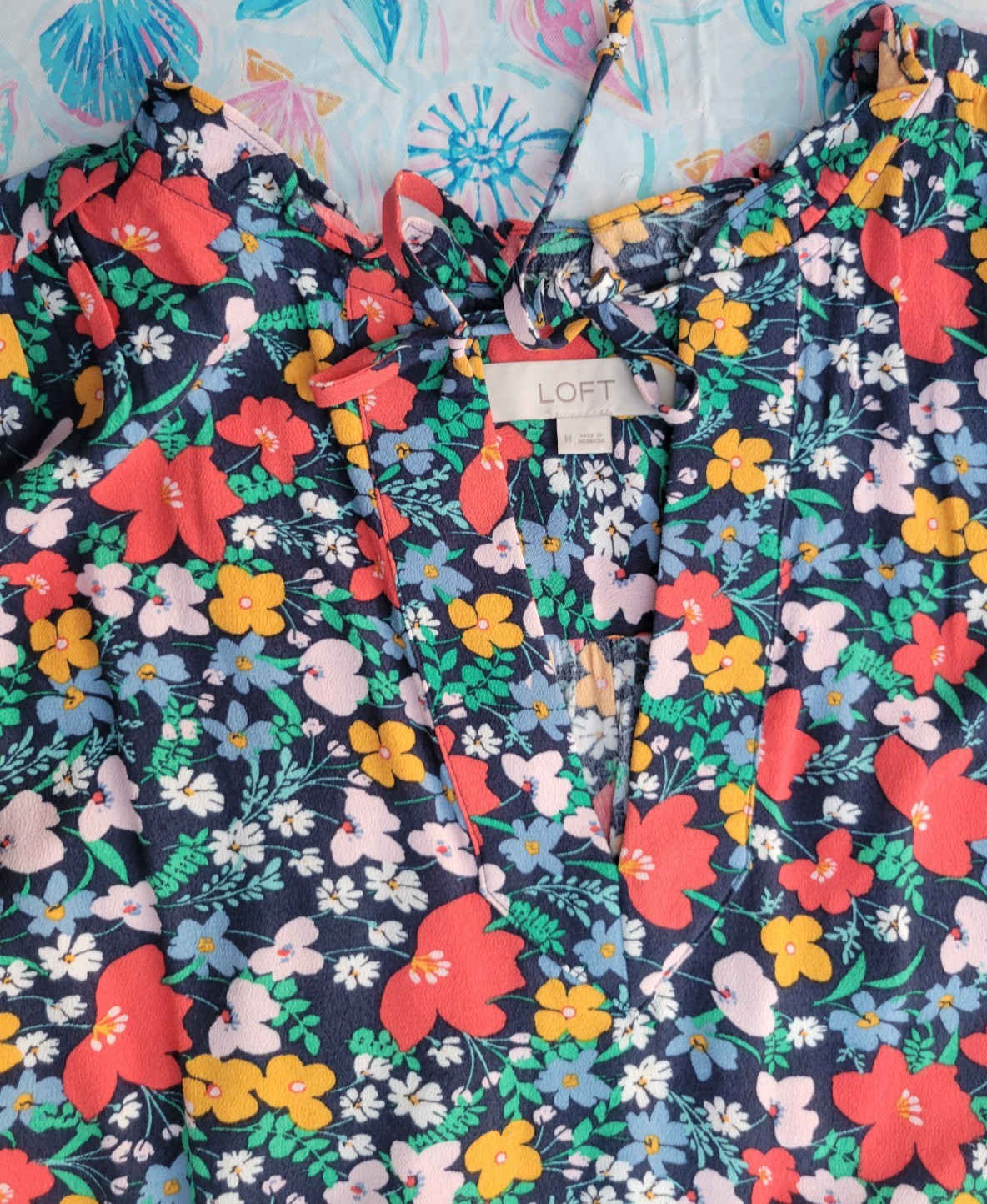 Blouse size (M) beautiful flowerery print by Loft , Fun