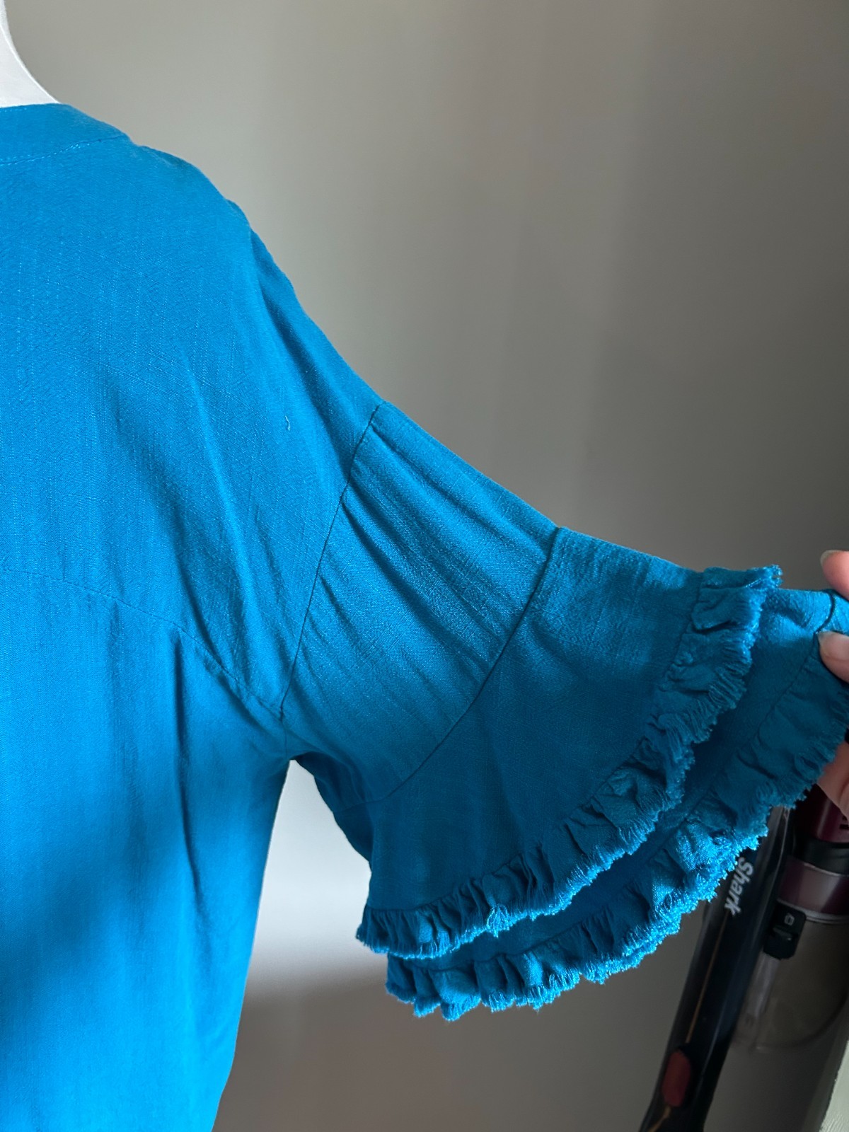 Umgee Teal Linen Blend Umgee Top with Split V Neck, Frayed Edge Sleeves and Hem