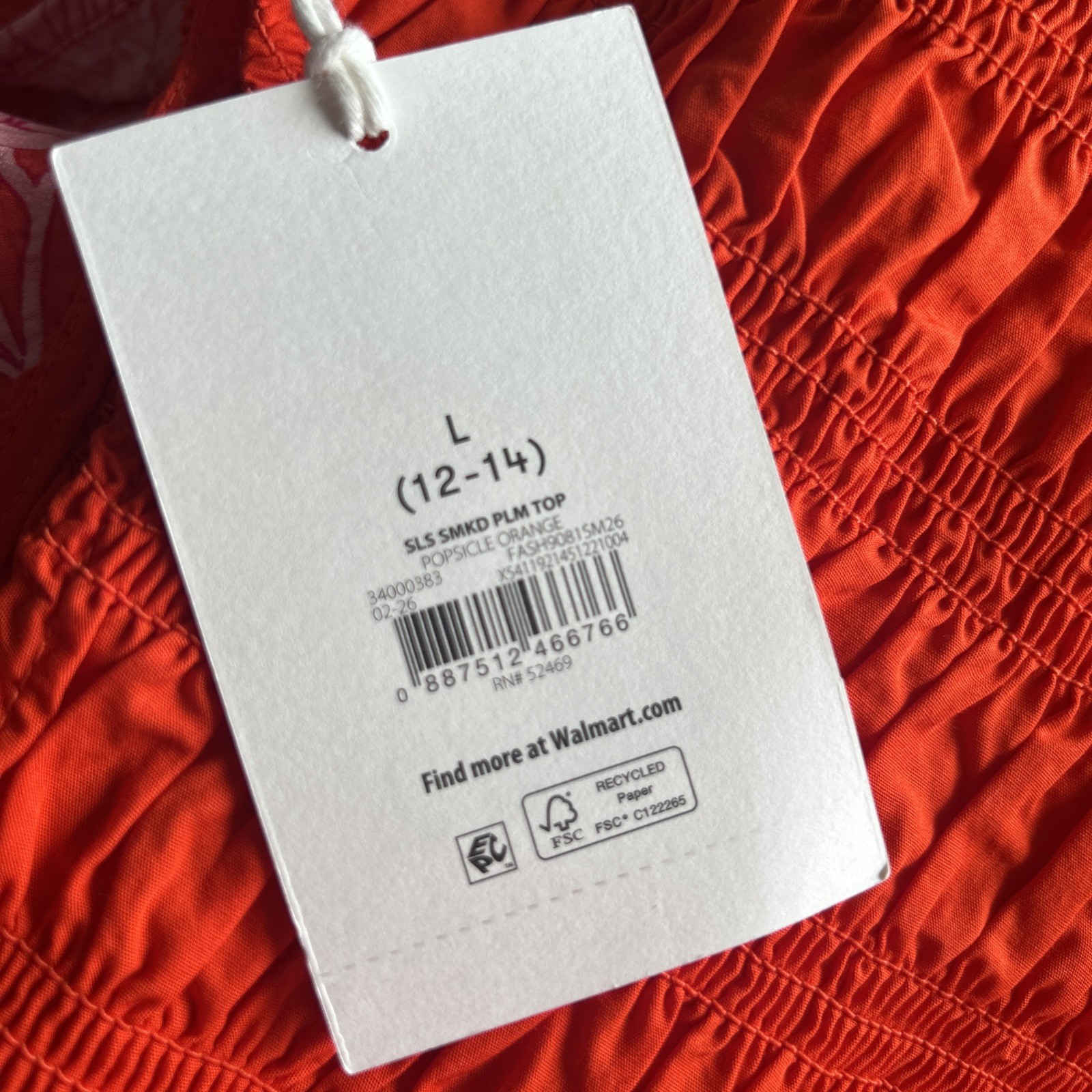 NWT Free Assembly Women’s L Smocked Orange Peplum Sleeveless Cotton Top