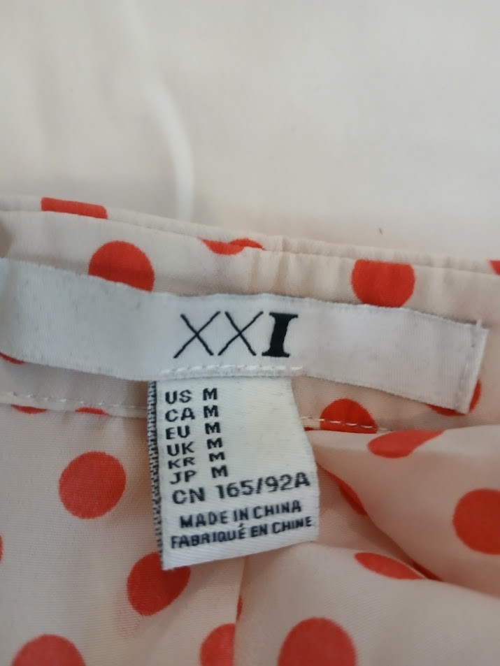 XXI white with coral poka dots sleeveless blouse