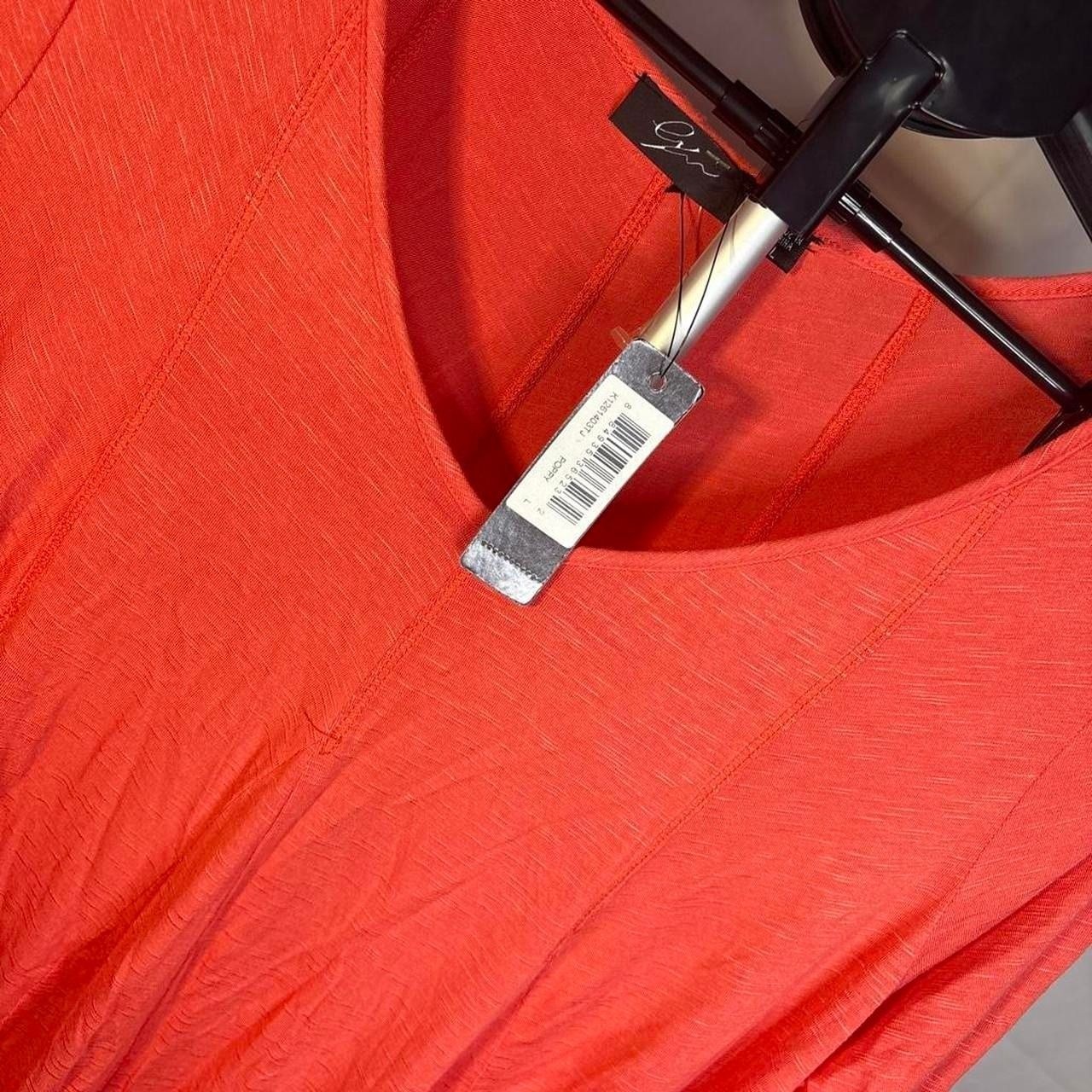 NWT poppy colored top with 3/4 sleeves
