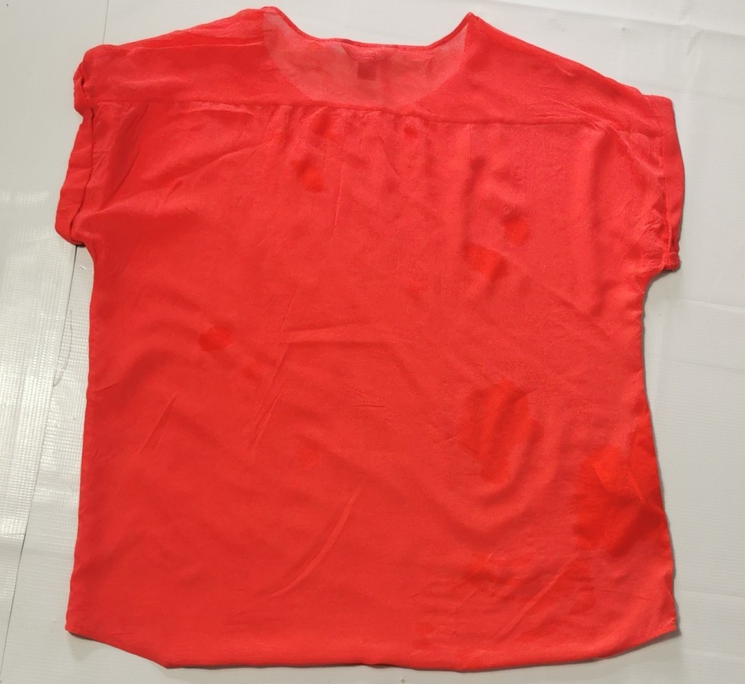 Tommy Bahama Silk Blouse. Silk blouse used in good condition 100% silk size: L