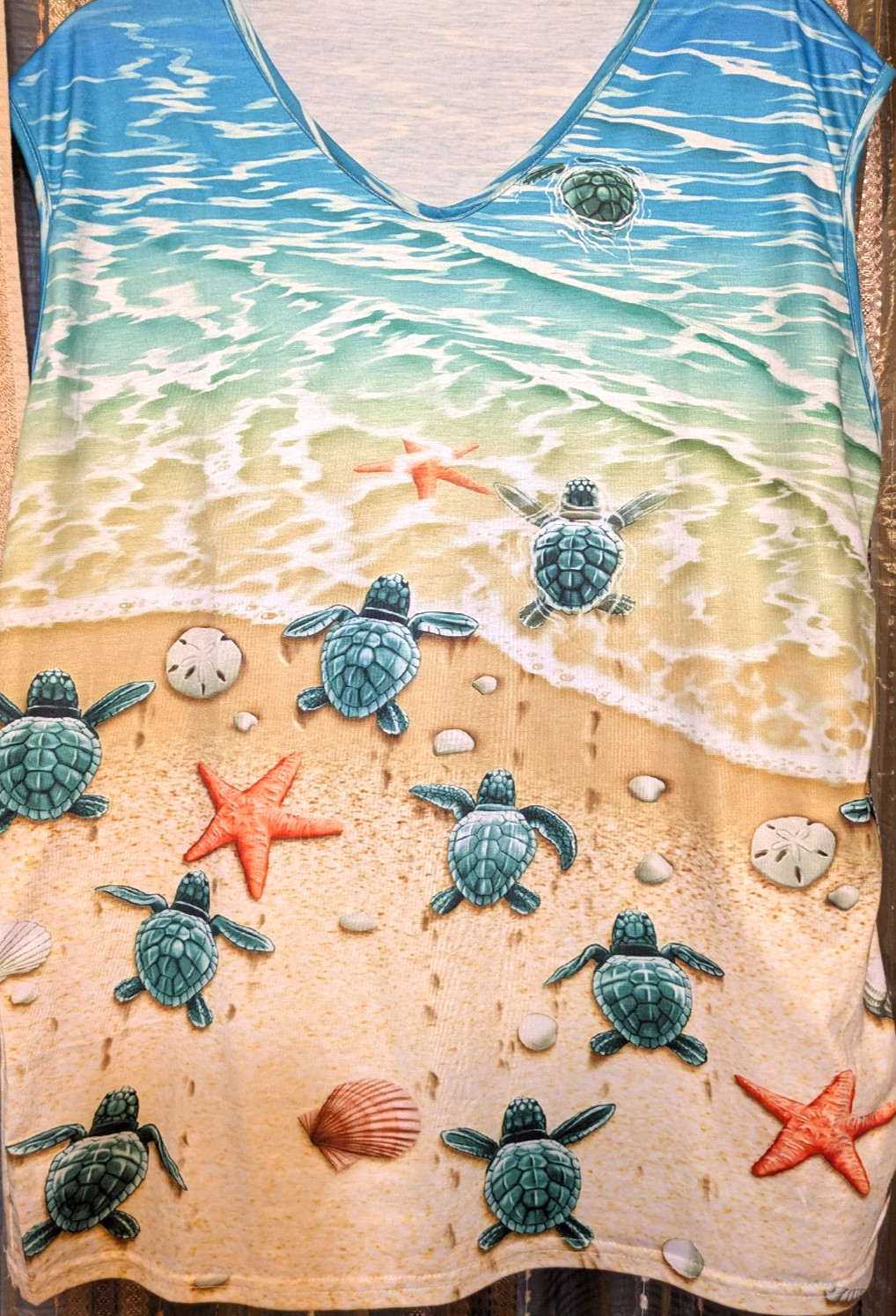 Serengeti women’s sleeveless tunic of being at the beach with turtles. Size XL