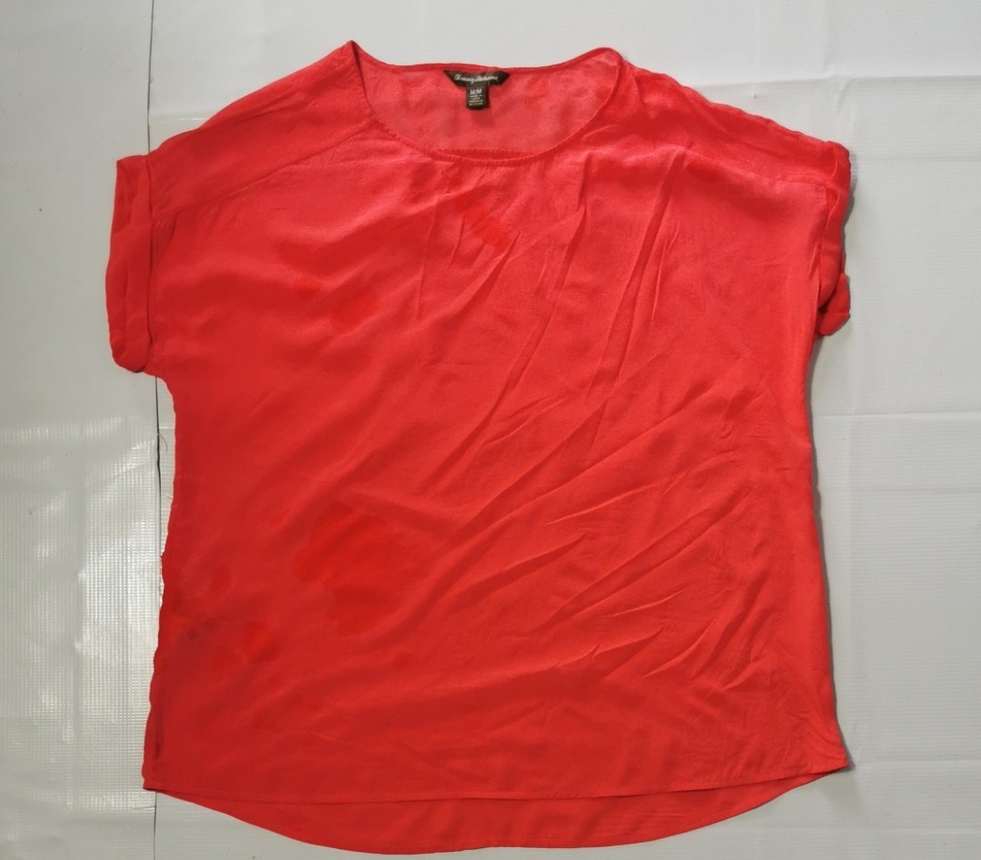 Tommy Bahama Silk Blouse. Silk blouse used in good condition 100% silk size: L