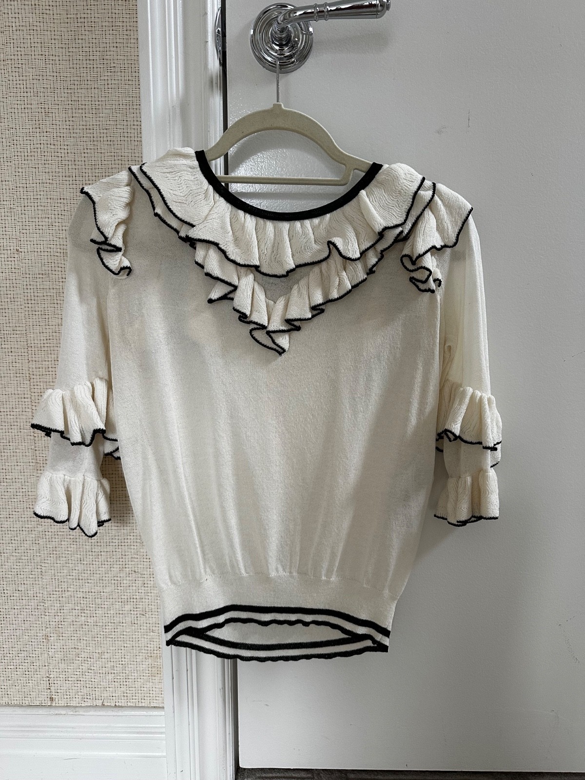 Womens blouse; Maje cream with ruffles with black piping