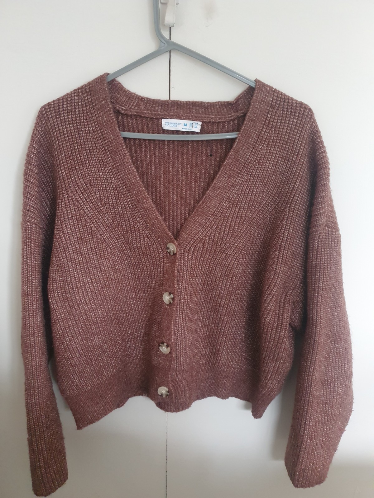 Primark cropped brown cardigan in size M but oversized fits 16-18