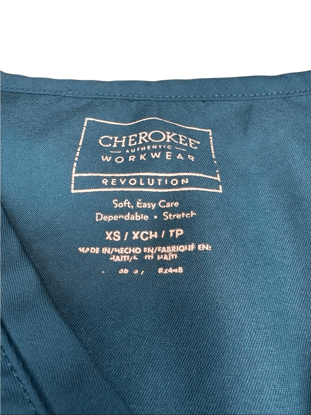 Cherokee Workwear Revolution Mock Wrap Scrub Top. Turquoise. Sz XS. Great Cond