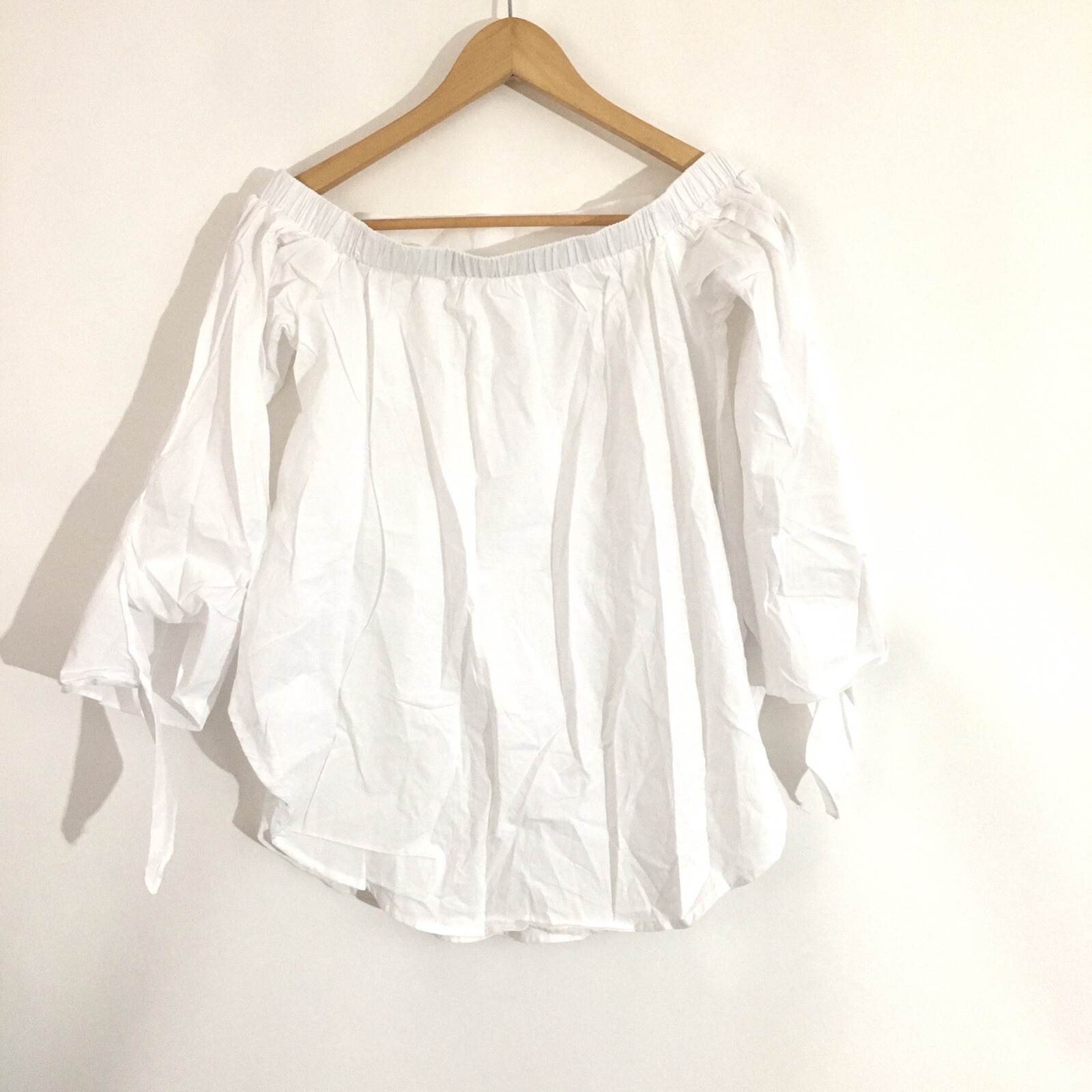 Bow Tie Dolphin Hem Bardot Blouse White