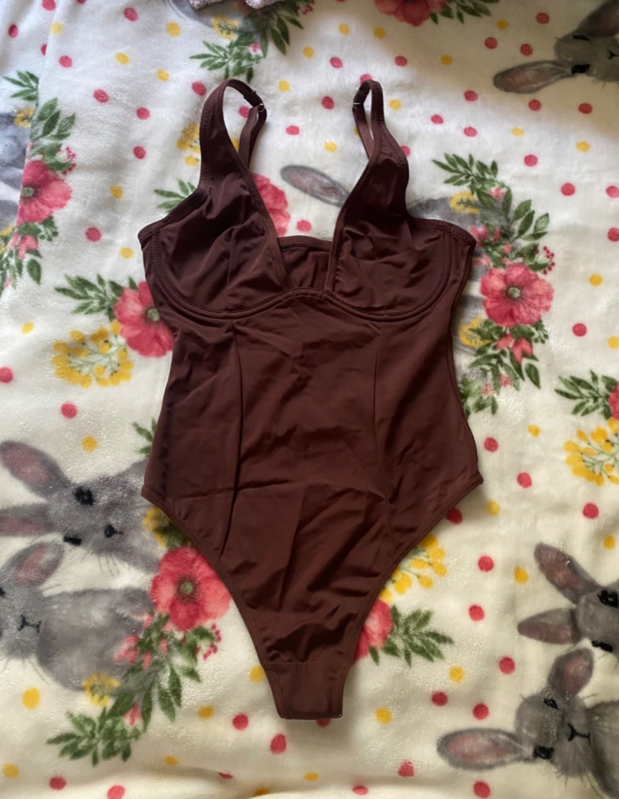 Woman’s v body suit adjustable straps size XS