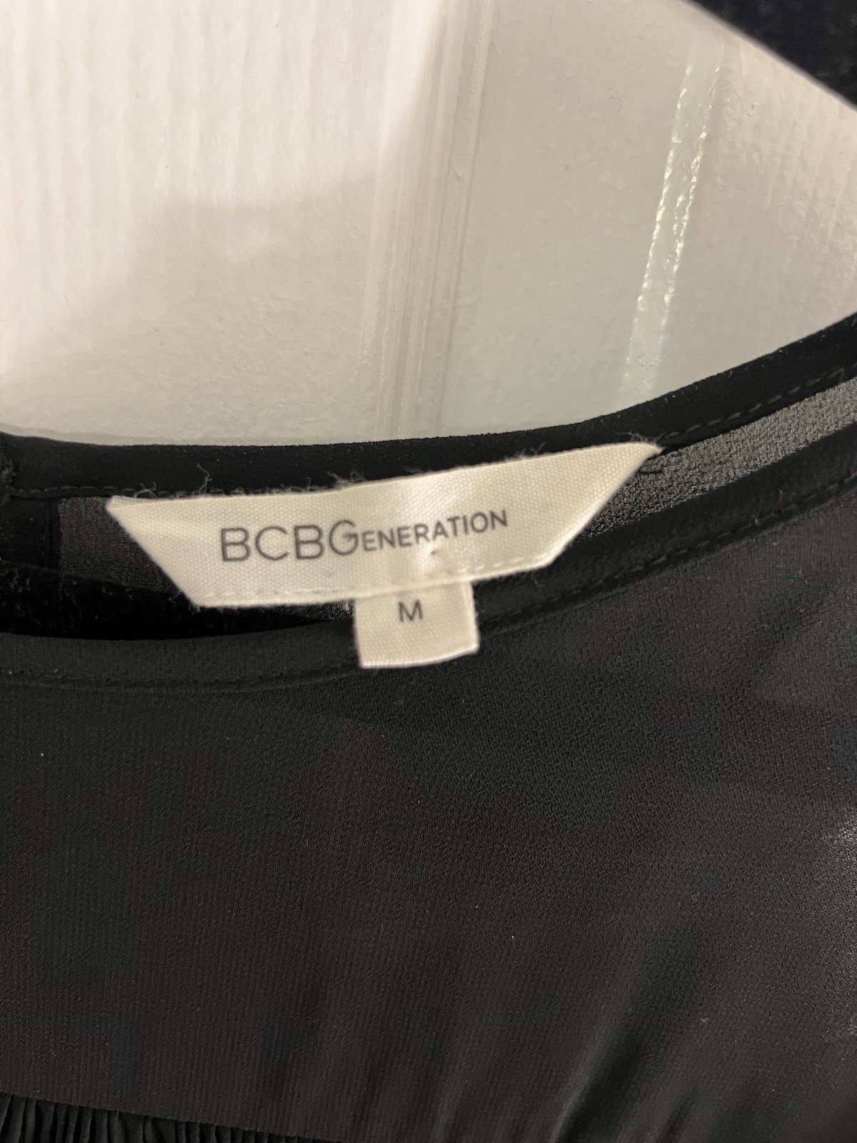 BCBGeneration Women’s Black Solid Sheer Round Neck Chiffon Ruffle Tie Blouse M