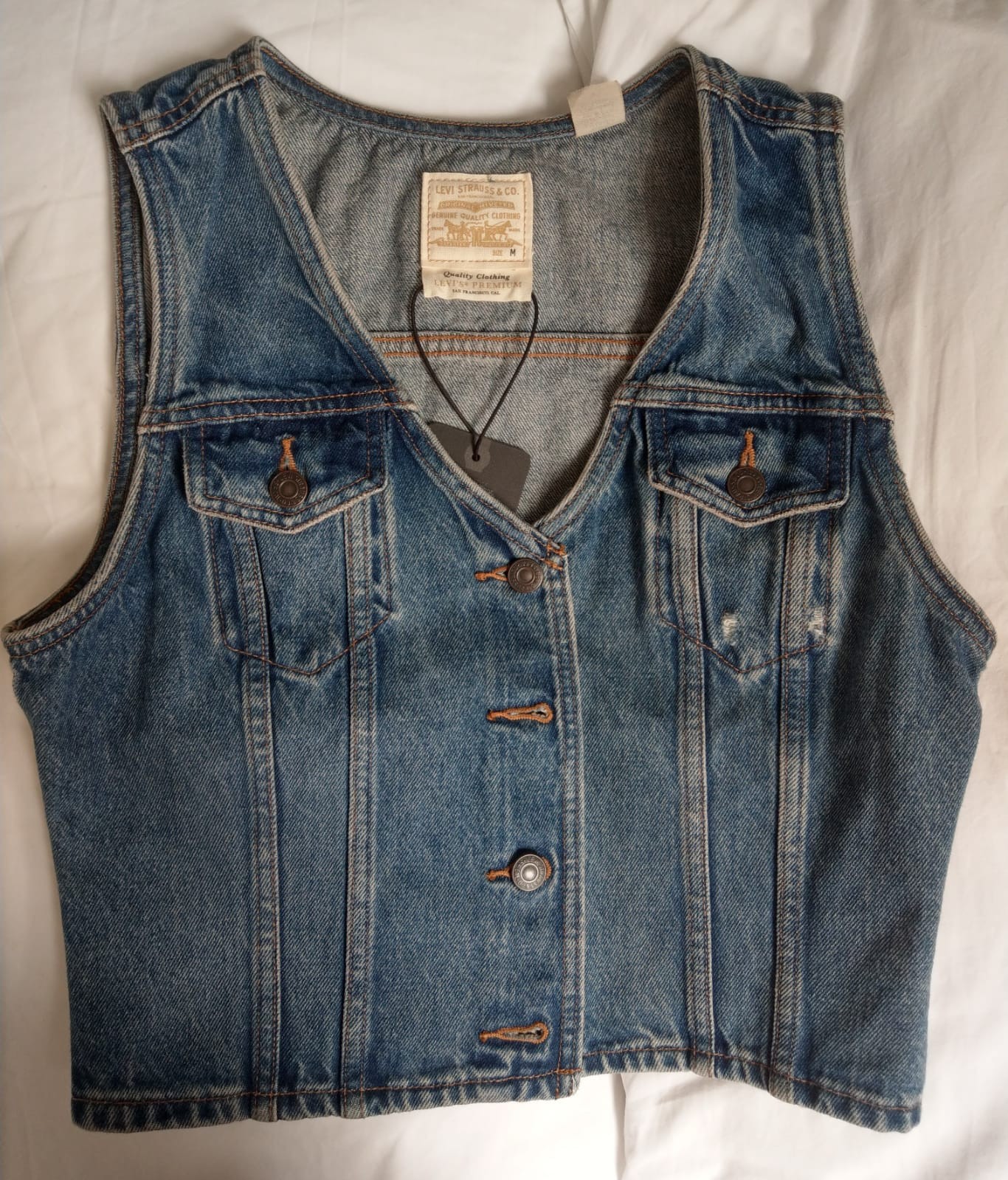 Levis Women’s denim vest, new, never worn with tags. Size: M