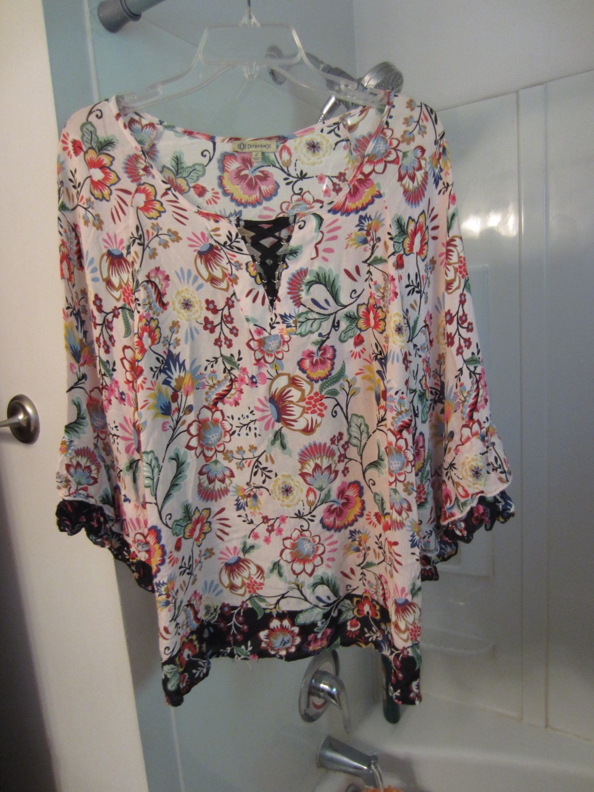 NWOT women’s short sleeved top Democracy Size L floral multi-colors