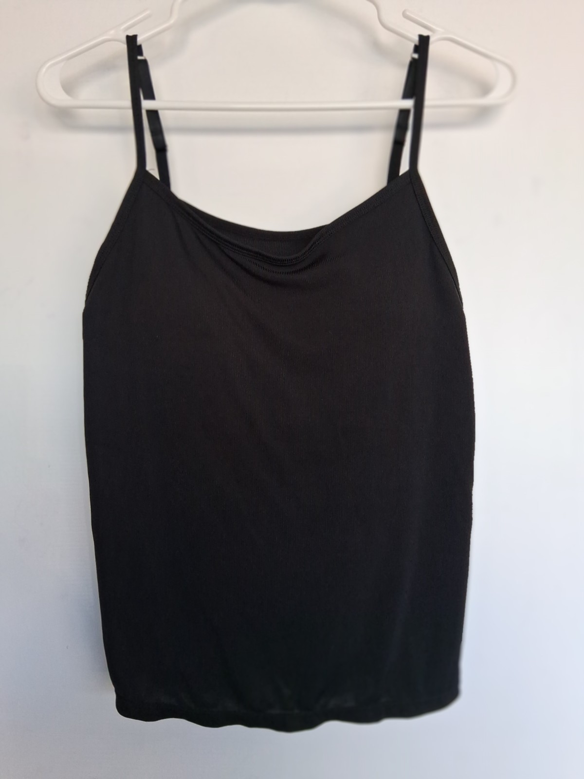 Size Small, black stretch cami w/ built in bra and adjustable straps. Excellent