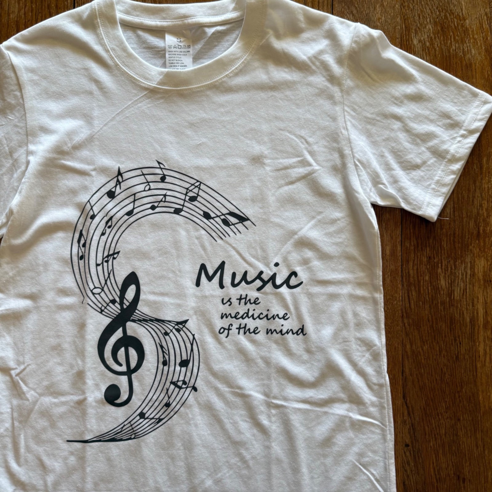 Music Shirt Womens S White Treble Clef Quote Music is the Medicine of Mind Tee