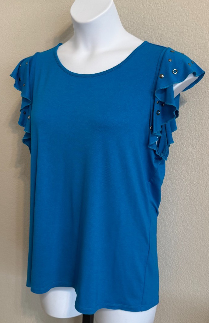 Cyrus ladies size L blouse with studded sleeves.