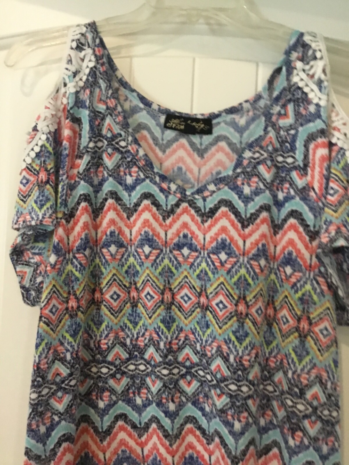 Cold-shoulder, Aztec pattern summer top; short sleeves. Large