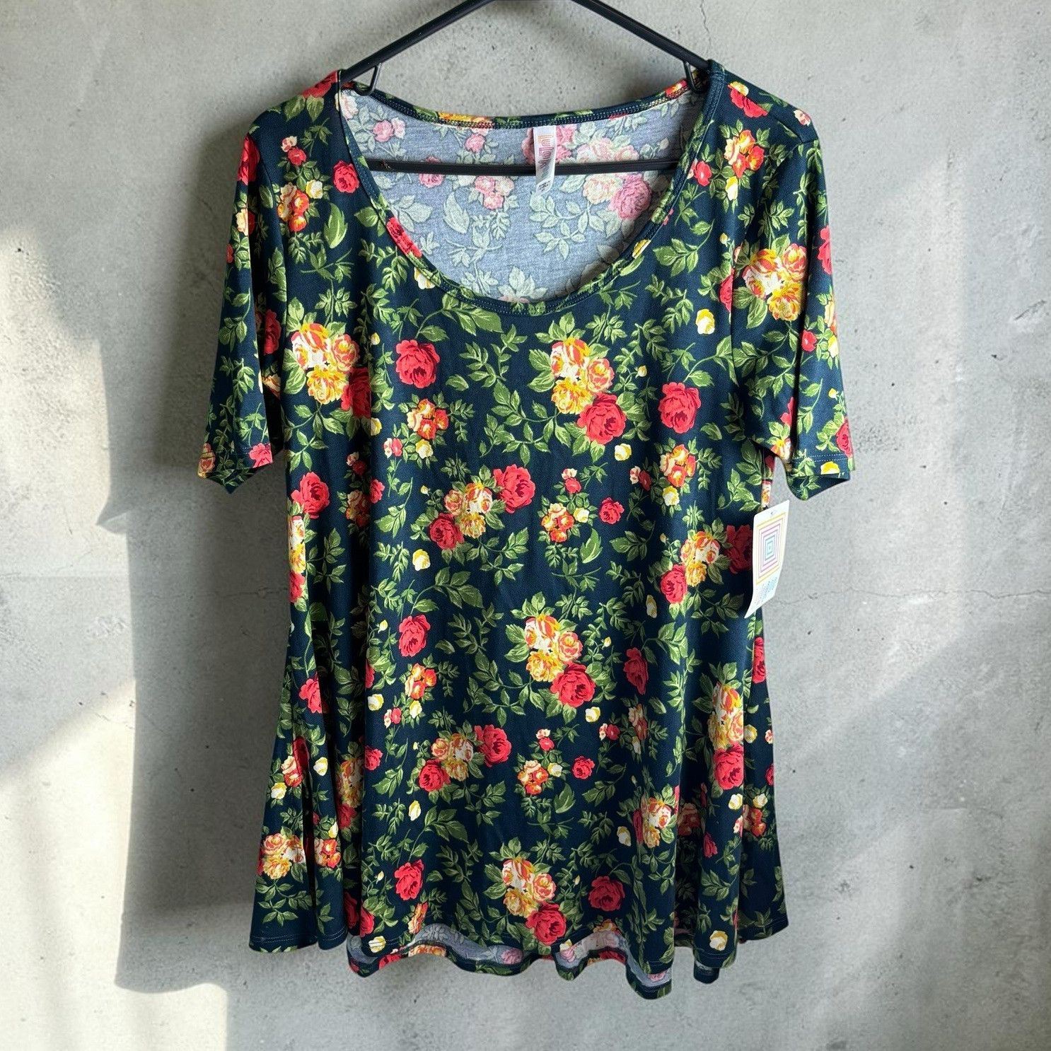 LuLaRoe Perfect T Shirt Women’s Size XS Navy Blue Red Yellow Floral Swing Top