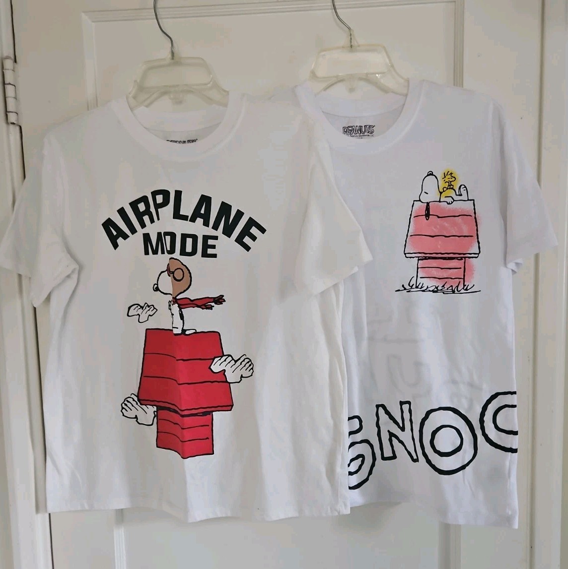 2 Peanuts Worldwide T-Shirts 2023 Snoopy & Woodstock 2025 Airplane Mode size M