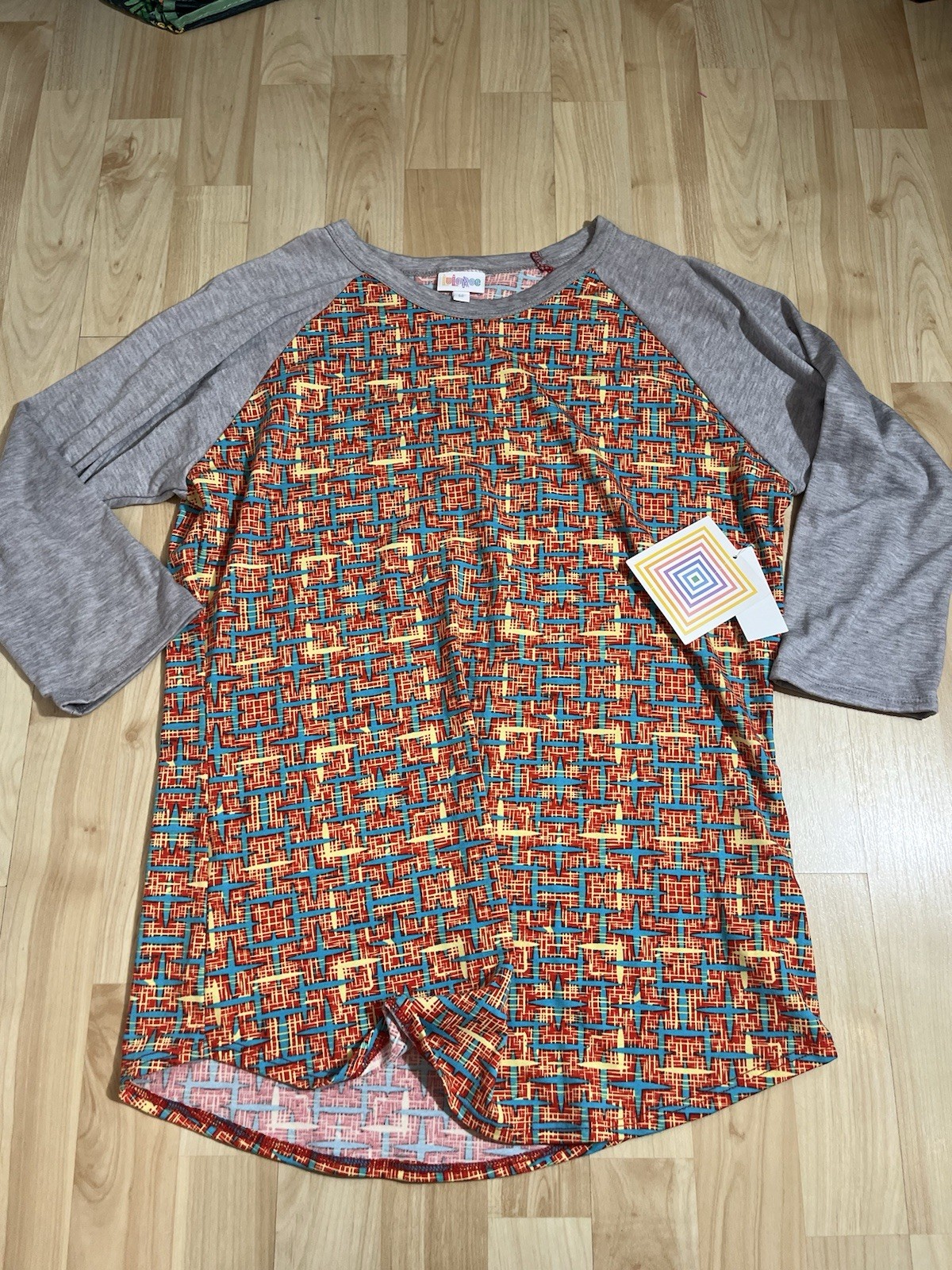 LuLaRoe Randy Baseball T-Shirt a geometric pattern on the body New Size Medium