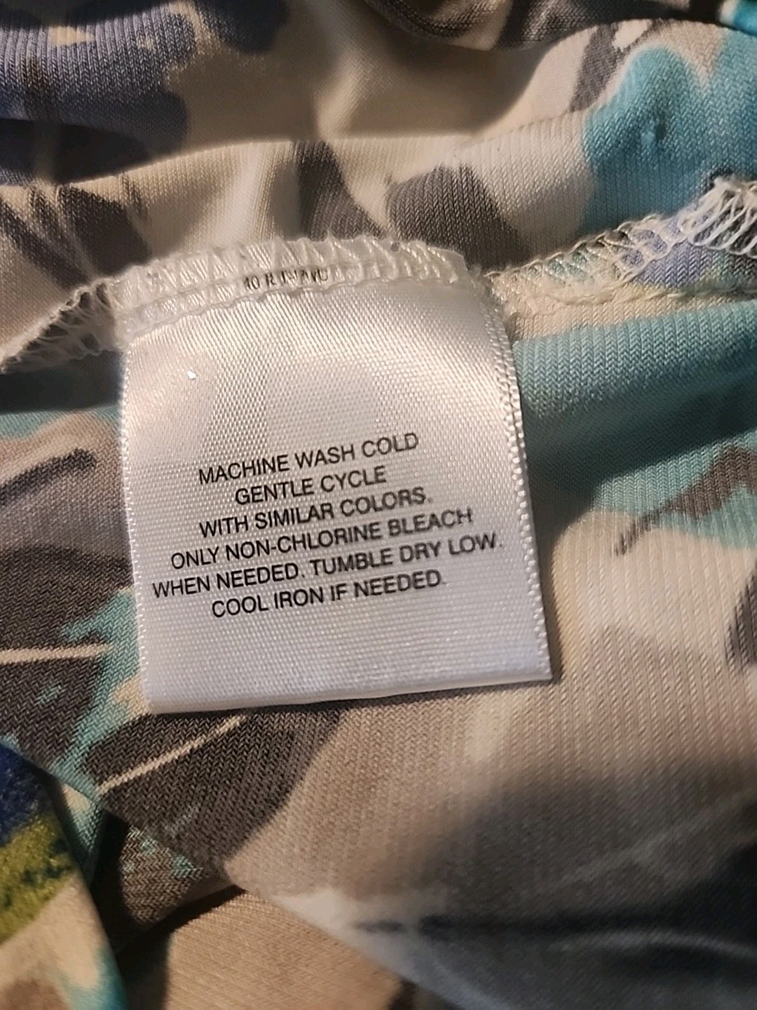 Covington Womens Size XL Blue Tan Floral Short Sleeve Pullover Top Stretch Knit