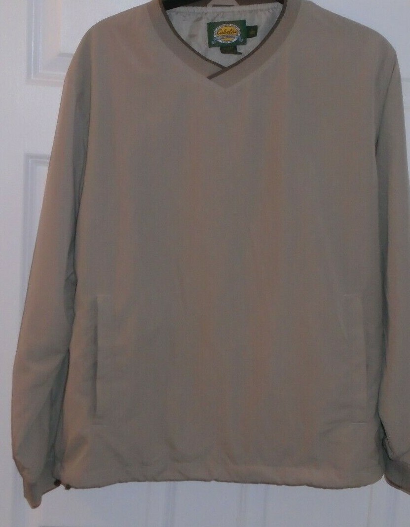 Cabela’s, women’s waterproof pullover, beige, size large