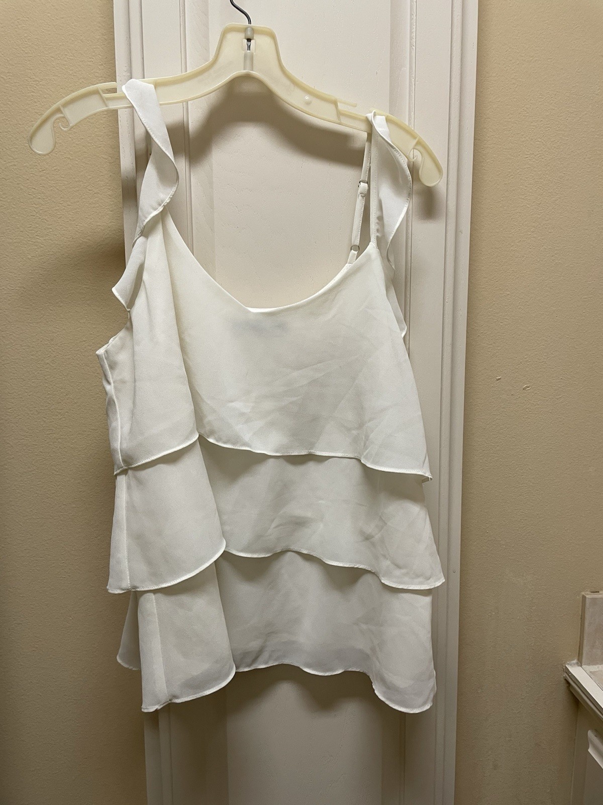 Sugar Lips tank, white, sleeveless and hits at hip, Size M