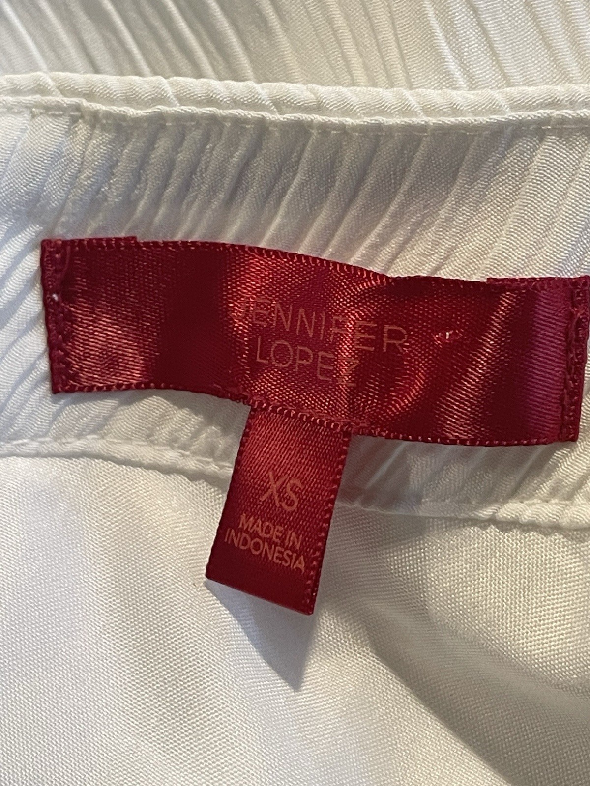 Jennifer Lopez Womens Sz XS One Shoulder White Grommet Crepe Blouse