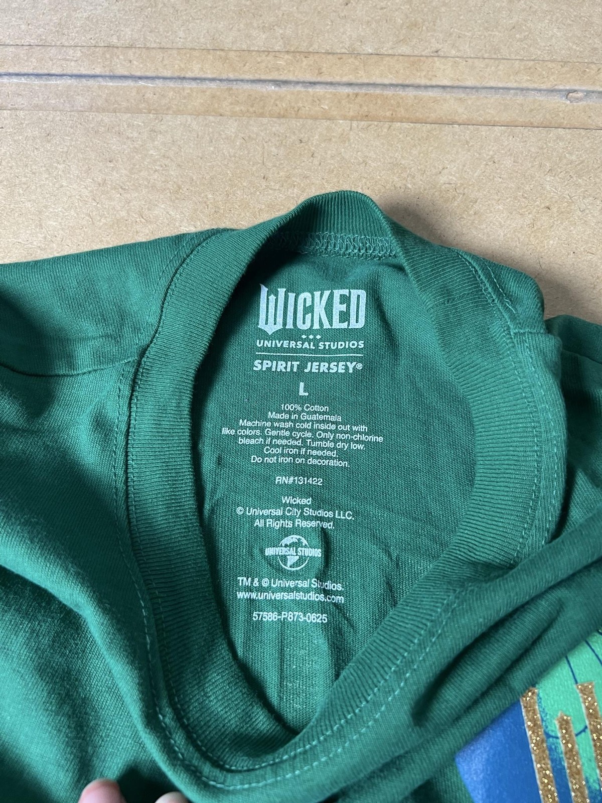 Universal Studios T-Shirt Unisex L Green Long Sleeve Jersey Glitter Pullover