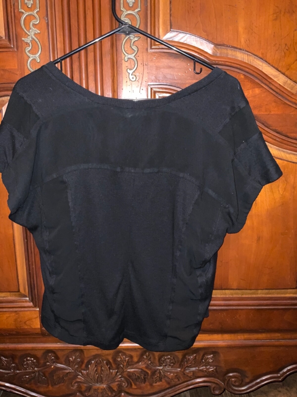BCBGENERATION ladies size small SHORTER IN FRONT black top