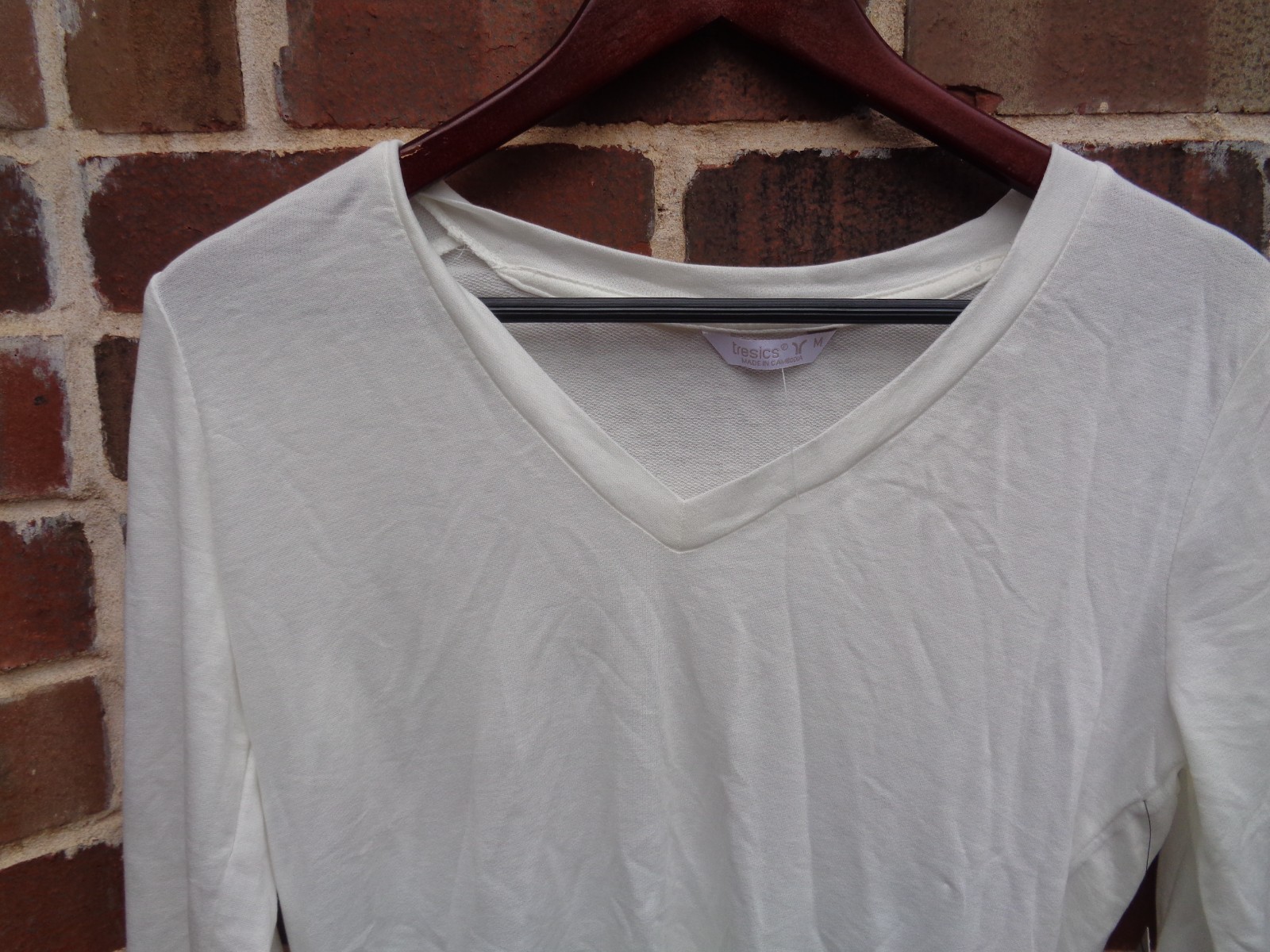 Tresics women top M white long sleeve NWT