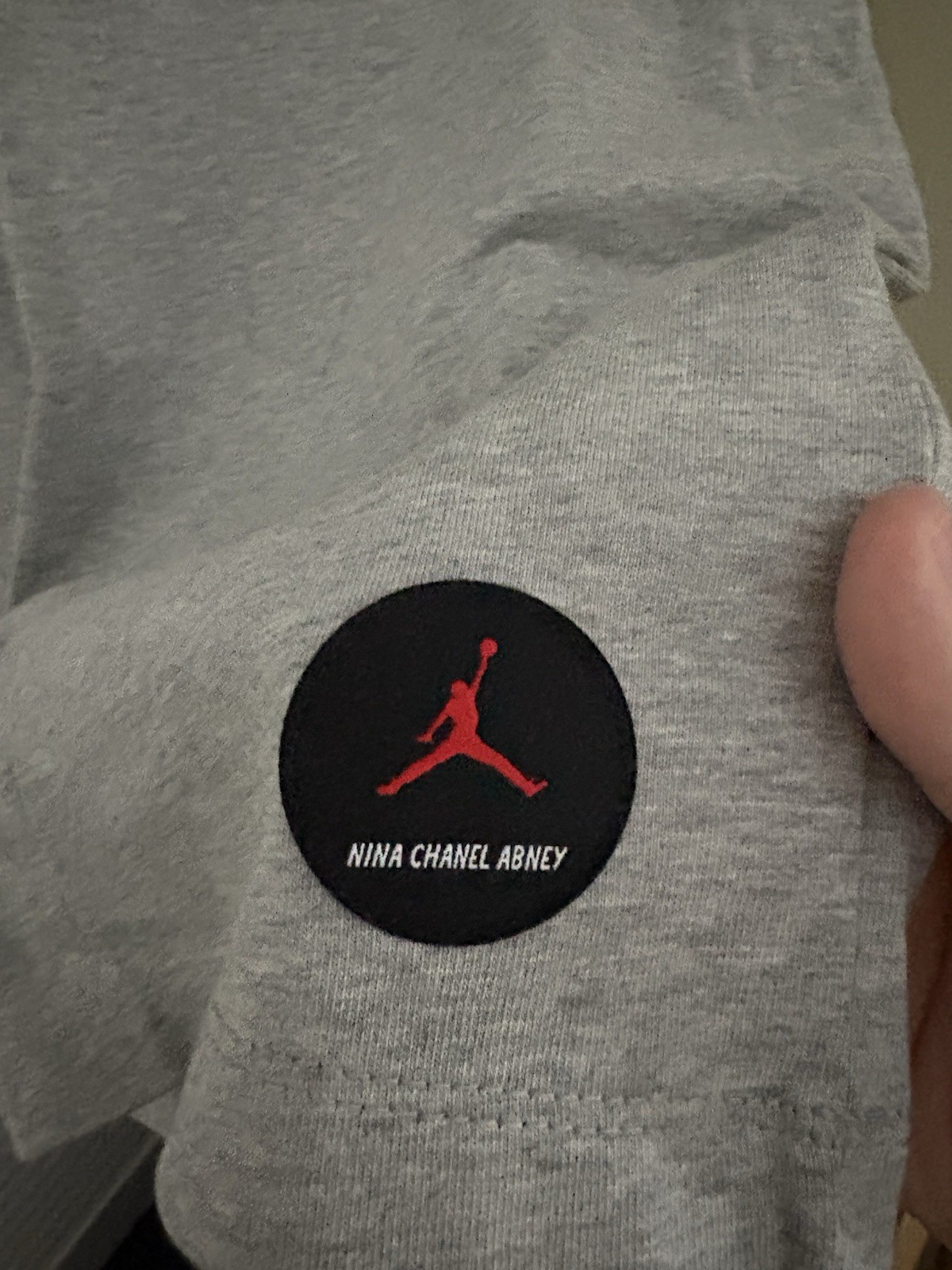 Jordan X Nina Chanel Abney Dark Grey Heather T-Shirt DO9805-063 Women’s Size S