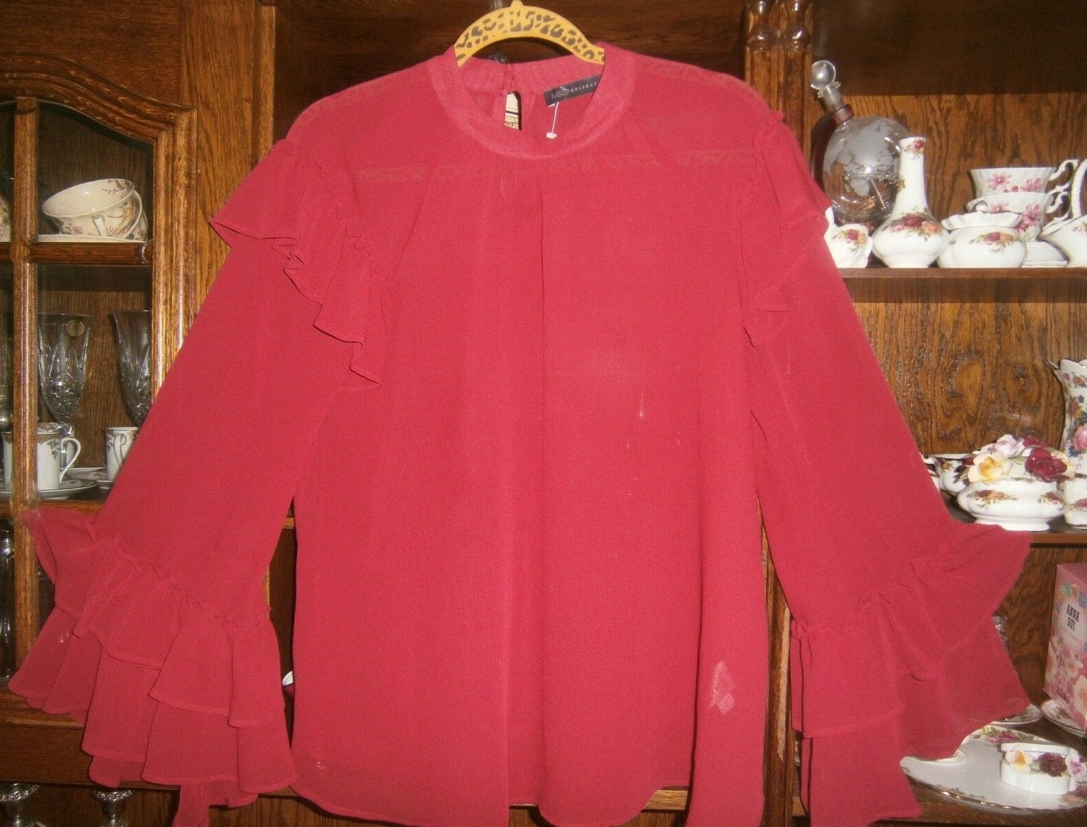 Marks & Spencer. NEW. Gorgeous Relaxed top. Stunning colour. Ruffles. UK 10