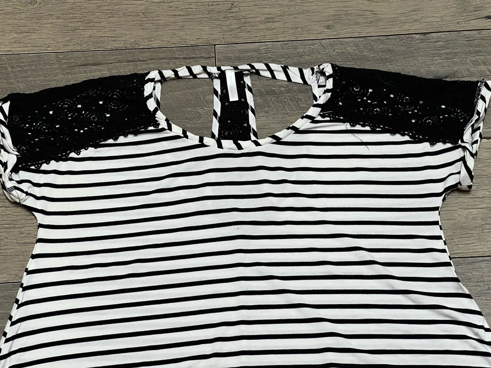 Pink Blush Boutique black and white tunic with crochet trim size S