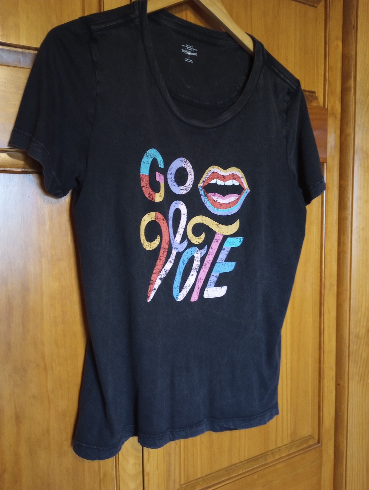 Anthropologie “Go Vote” Tee w/ inside out side stitch charcoal black Size Small