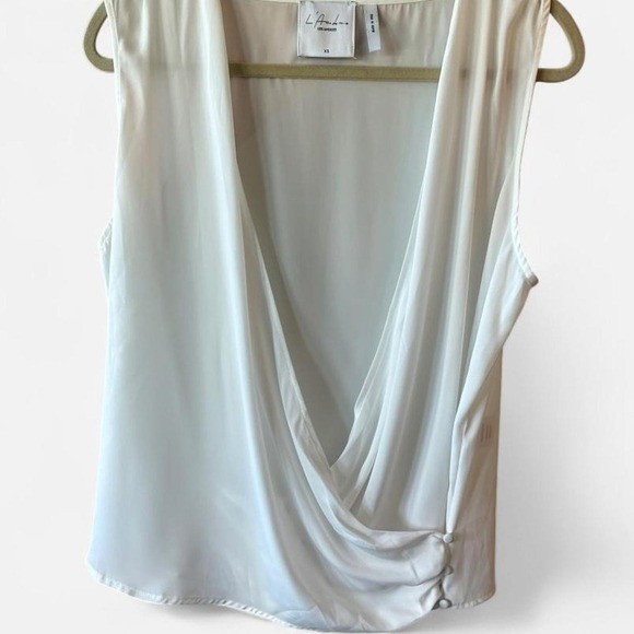 L’Académie white sleeveless plunge blouse w/ wrap style & buttons Sz XS