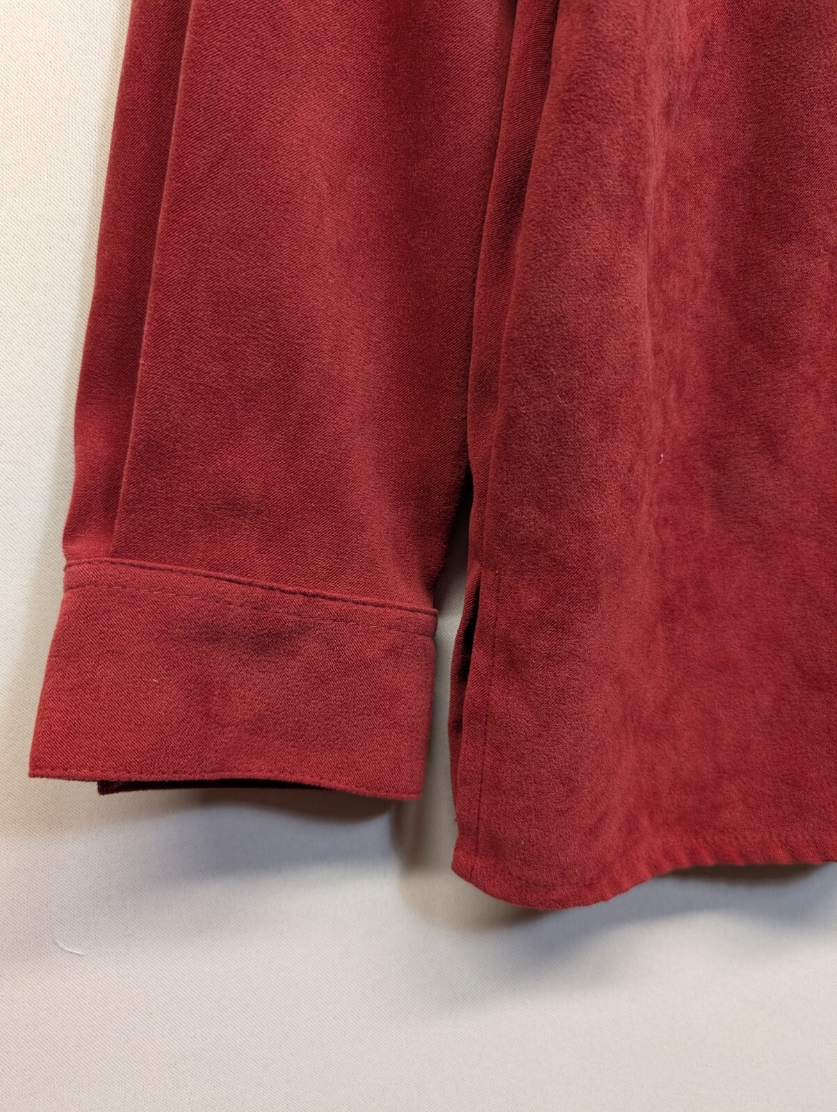 Cascade Blues. Red Rust, long sleeve, crystal button up front top. size L