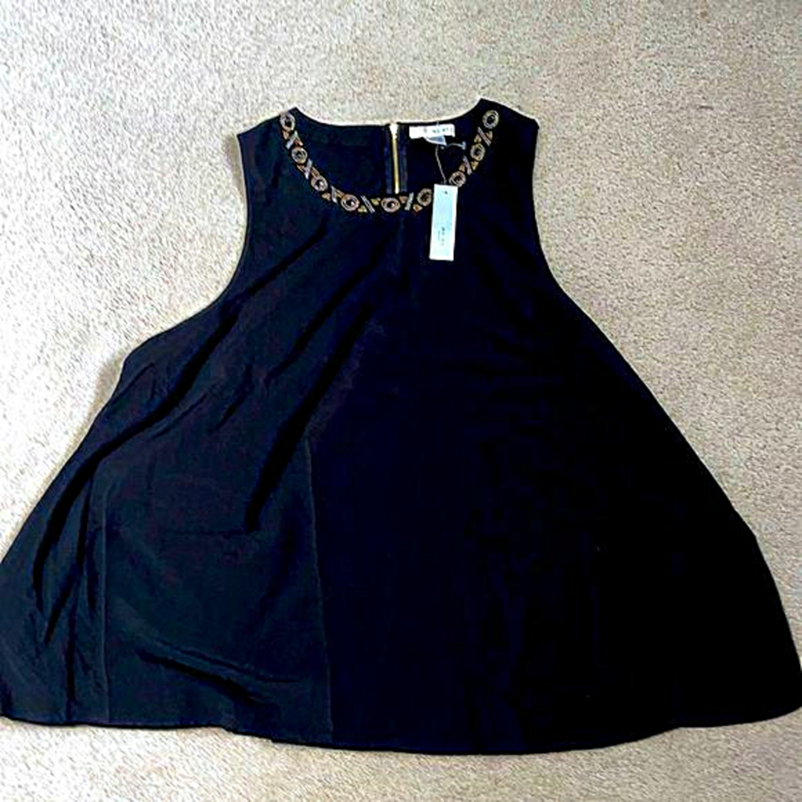 NWT beautiful super flowy shirt w/neckline detailing and incredibly light fabric