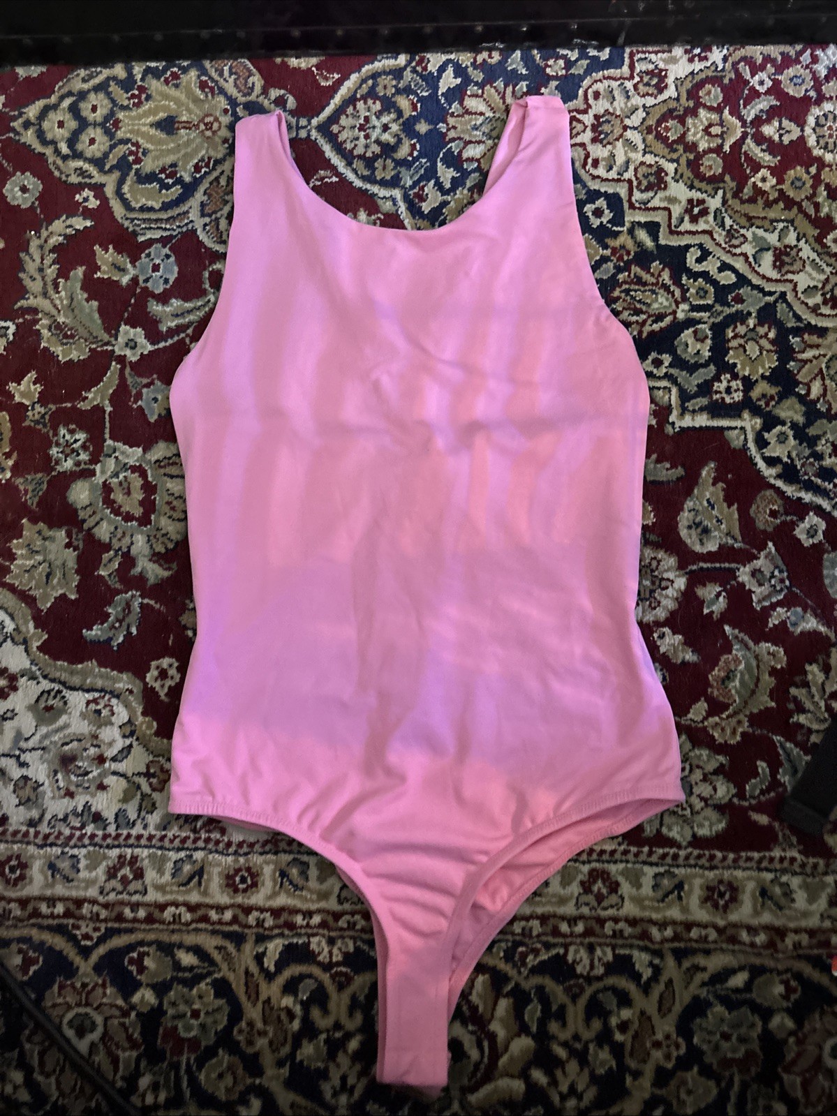 Pink Body Suit with with Neck and Cross Detail On The Back. Size Medium