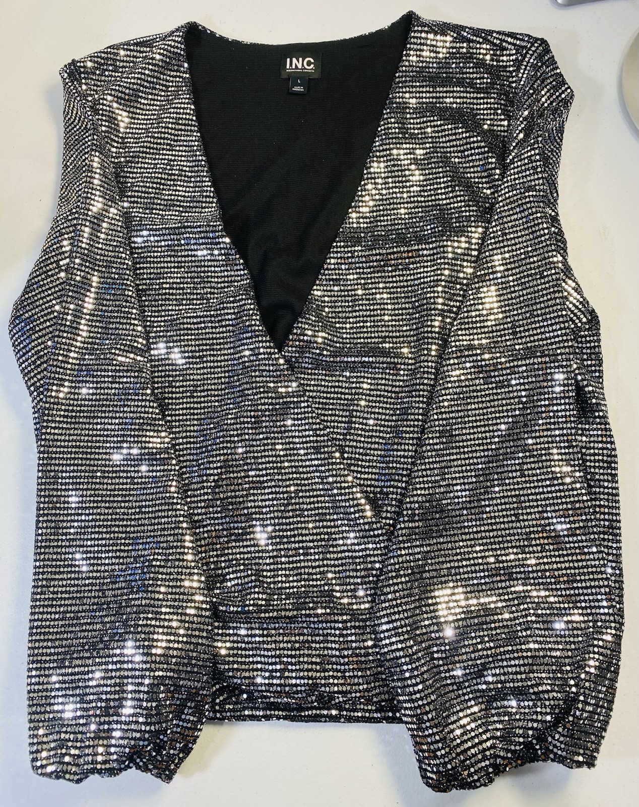 A Silver Sequin Long-sleeve Surplice (wrap-style) Blouse
