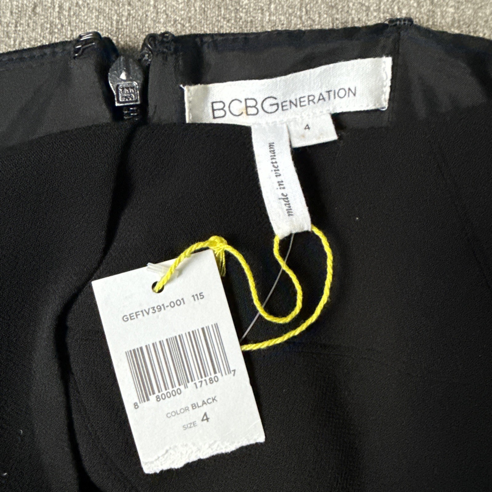 NWT BCBGENERATION Strapless Asymmetrical Top in Black Size 4