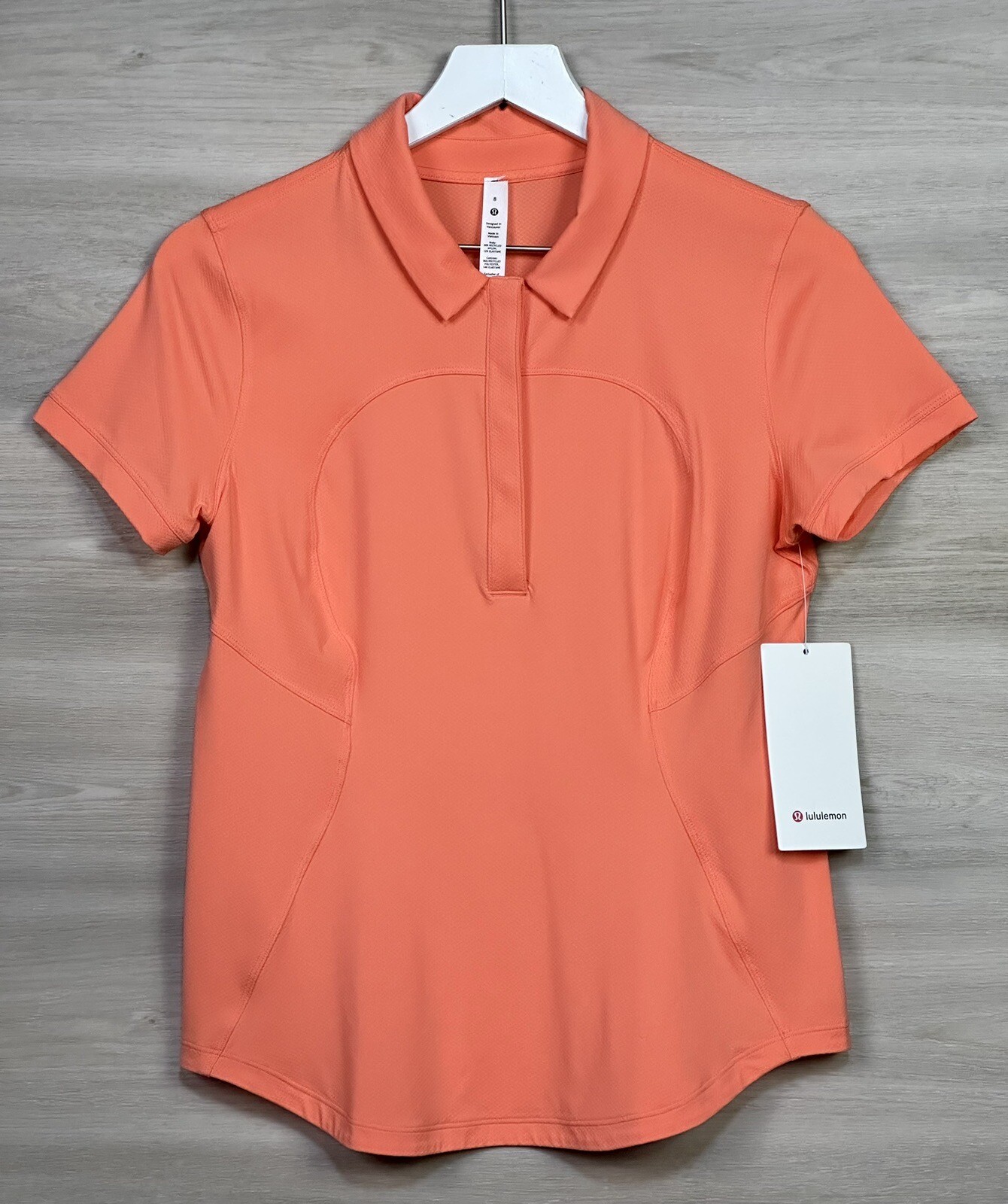 Lululemon Quick Drying Short Sleeve Polo Slim Size 8 Sunny Coral 03192