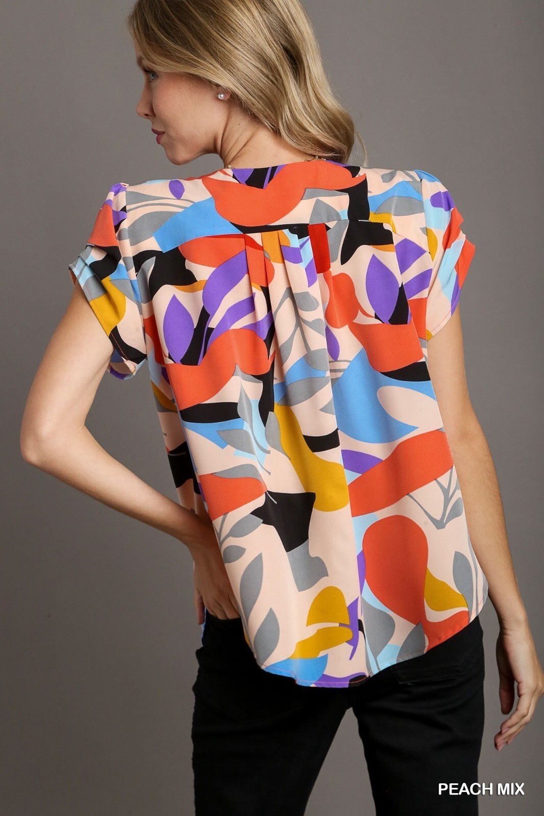 Umgee Short Sleeved Multi Abstract Print Top Split Neckline Rounded High Low Hem