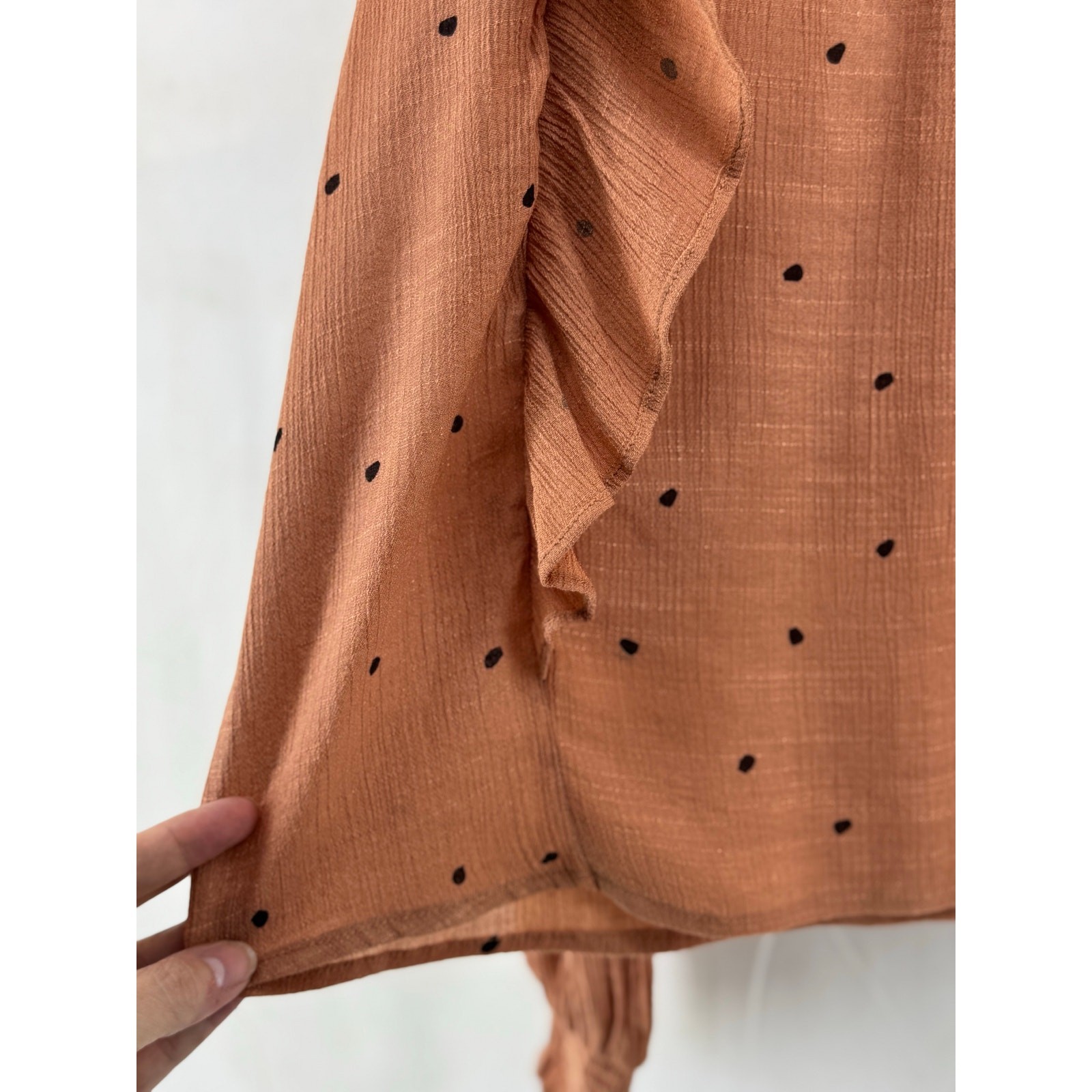 Mine L women’s rust orange, long sleeved ruffle pesent blouse