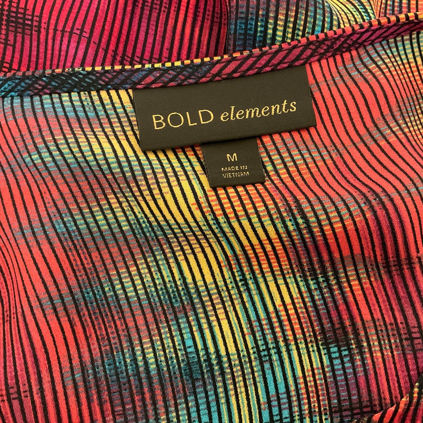 Bold Elements Woman’s Multi Color Polyester Blouse Size Med With Gold Color Bar
